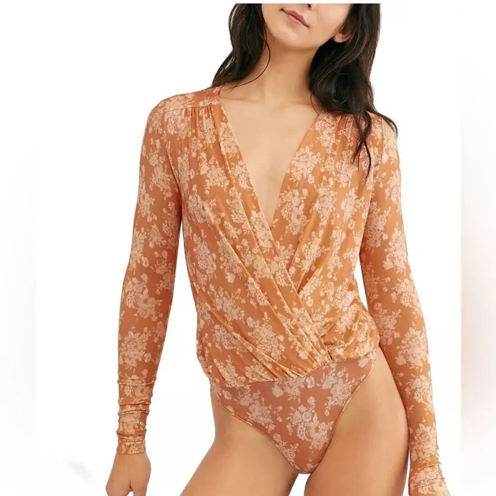 NWT-FREE PEOPLE Turnt Bodysuit